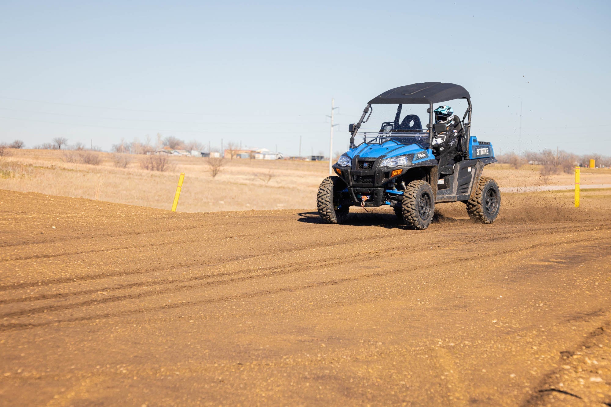 Hisun Powersports riding on a dirt track